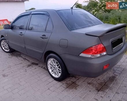Мицубиси Лансер 2007 в Ивано-Франковске на Automoto.ua Серый Мицубиси Лансер, объемом двигателя 1.58 л и пробегом 238 тыс. км за 2950 $, фото 4 на Automoto.ua
