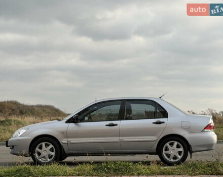 Сірий Міцубісі Lancer, об'ємом двигуна 1.3 л та пробігом 160 тис. км за 4999 $, фото 6 на Automoto.ua