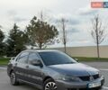 Серый Мицубиси Лансер, объемом двигателя 1.58 л и пробегом 194 тыс. км за 4900 $, фото 1 на Automoto.ua