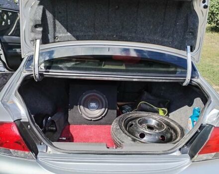 Сірий Міцубісі Lancer, об'ємом двигуна 1.6 л та пробігом 290 тис. км за 4600 $, фото 3 на Automoto.ua