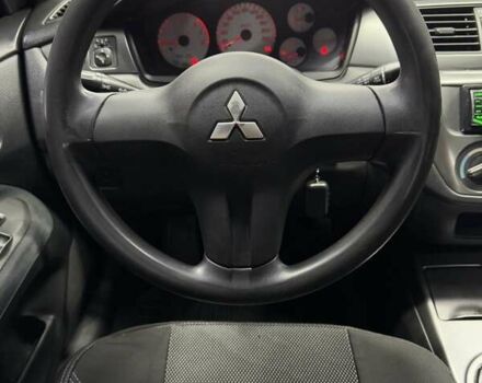 Серый Мицубиси Лансер, объемом двигателя 1.58 л и пробегом 271 тыс. км за 4200 $, фото 27 на Automoto.ua