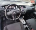 Сірий Міцубісі Lancer, об'ємом двигуна 1.58 л та пробігом 122 тис. км за 6300 $, фото 39 на Automoto.ua