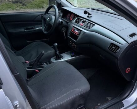 Серый Мицубиси Лансер, объемом двигателя 1.6 л и пробегом 226 тыс. км за 3300 $, фото 8 на Automoto.ua