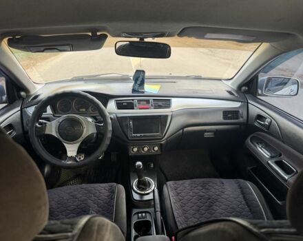 Серый Мицубиси Лансер, объемом двигателя 2 л и пробегом 185 тыс. км за 4600 $, фото 9 на Automoto.ua