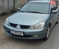 Сірий Міцубісі Lancer, об'ємом двигуна 1.58 л та пробігом 306 тис. км за 3400 $, фото 1 на Automoto.ua