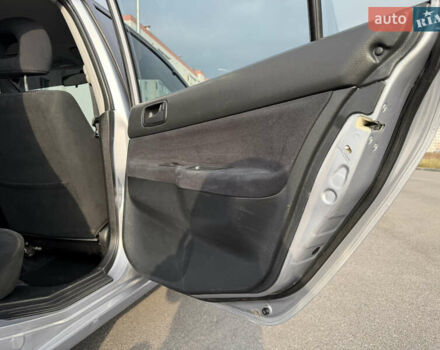 Серый Мицубиси Лансер, объемом двигателя 1.3 л и пробегом 160 тыс. км за 5555 $, фото 56 на Automoto.ua