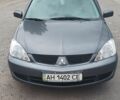 Сірий Міцубісі Lancer, об'ємом двигуна 1.58 л та пробігом 100 тис. км за 5700 $, фото 13 на Automoto.ua