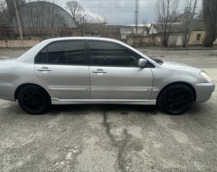 Сірий Міцубісі Lancer, об'ємом двигуна 1.6 л та пробігом 200 тис. км за 4200 $, фото 3 на Automoto.ua