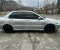 Сірий Міцубісі Lancer, об'ємом двигуна 1.6 л та пробігом 200 тис. км за 4200 $, фото 3 на Automoto.ua