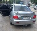 Серый Мицубиси Лансер, объемом двигателя 1.6 л и пробегом 298 тыс. км за 4100 $, фото 5 на Automoto.ua