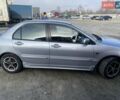 Сірий Міцубісі Lancer, об'ємом двигуна 1.6 л та пробігом 310 тис. км за 3100 $, фото 1 на Automoto.ua