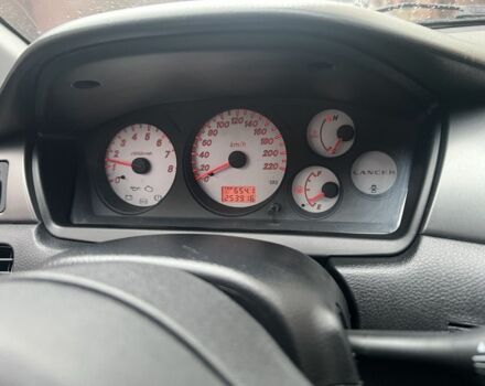 Серый Мицубиси Лансер, объемом двигателя 1.6 л и пробегом 272 тыс. км за 4500 $, фото 14 на Automoto.ua
