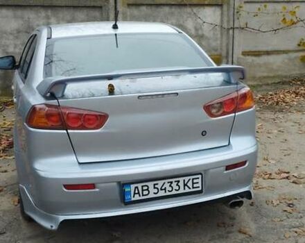 Серый Мицубиси Лансер, объемом двигателя 2 л и пробегом 305 тыс. км за 6300 $, фото 8 на Automoto.ua