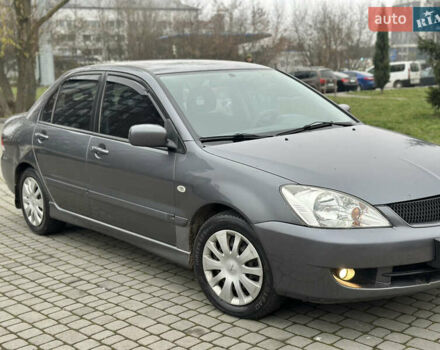Сірий Міцубісі Lancer, об'ємом двигуна 1.6 л та пробігом 177 тис. км за 2800 $, фото 12 на Automoto.ua