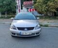 Сірий Міцубісі Lancer, об'ємом двигуна 2 л та пробігом 293 тис. км за 3999 $, фото 1 на Automoto.ua