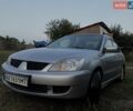 Серый Мицубиси Лансер, объемом двигателя 1.6 л и пробегом 286 тыс. км за 3998 $, фото 2 на Automoto.ua