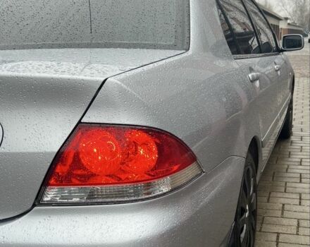 Серый Мицубиси Лансер, объемом двигателя 1.6 л и пробегом 272 тыс. км за 4500 $, фото 5 на Automoto.ua