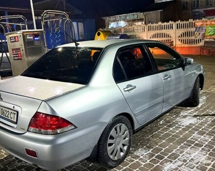 Сірий Міцубісі Lancer, об'ємом двигуна 1.6 л та пробігом 244 тис. км за 3900 $, фото 2 на Automoto.ua