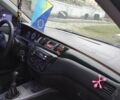Сірий Міцубісі Lancer, об'ємом двигуна 1.6 л та пробігом 337 тис. км за 4600 $, фото 9 на Automoto.ua