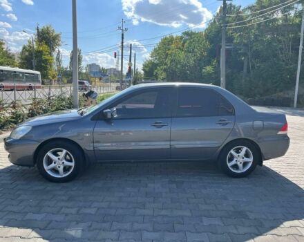 Серый Мицубиси Лансер, объемом двигателя 1.6 л и пробегом 161 тыс. км за 4800 $, фото 6 на Automoto.ua