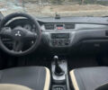 Сірий Міцубісі Lancer, об'ємом двигуна 1.58 л та пробігом 210 тис. км за 1300 $, фото 1 на Automoto.ua