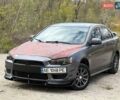 Сірий Міцубісі Lancer, об'ємом двигуна 1.5 л та пробігом 222 тис. км за 4999 $, фото 1 на Automoto.ua