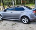 Серый Мицубиси Лансер, объемом двигателя 2 л и пробегом 257 тыс. км за 5900 $, фото 27 на Automoto.ua