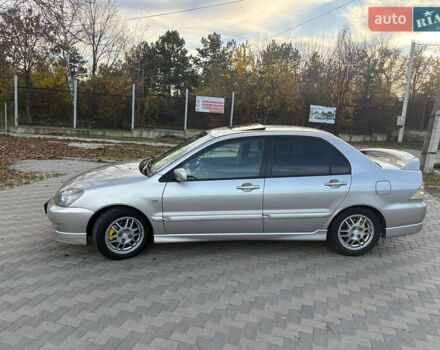 Серый Мицубиси Лансер, объемом двигателя 2 л и пробегом 184 тыс. км за 4900 $, фото 3 на Automoto.ua