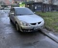 Серый Мицубиси Лансер, объемом двигателя 1.6 л и пробегом 218 тыс. км за 2800 $, фото 1 на Automoto.ua