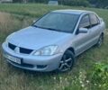 Сірий Міцубісі Lancer, об'ємом двигуна 1.6 л та пробігом 294 тис. км за 3350 $, фото 1 на Automoto.ua
