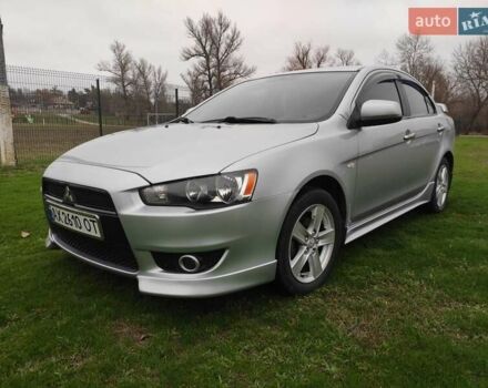 Сірий Міцубісі Lancer, об'ємом двигуна 2 л та пробігом 124 тис. км за 7499 $, фото 3 на Automoto.ua