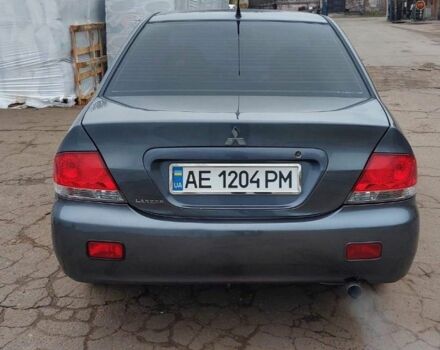 Серый Мицубиси Лансер, объемом двигателя 1.6 л и пробегом 220 тыс. км за 4200 $, фото 3 на Automoto.ua