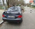 Сірий Міцубісі Lancer, об'ємом двигуна 1.58 л та пробігом 250 тис. км за 4750 $, фото 6 на Automoto.ua
