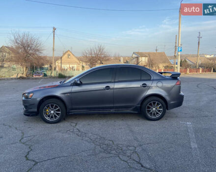 Серый Мицубиси Лансер, объемом двигателя 1.5 л и пробегом 224 тыс. км за 6300 $, фото 7 на Automoto.ua