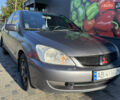 Сірий Міцубісі Lancer, об'ємом двигуна 1.58 л та пробігом 341 тис. км за 2200 $, фото 1 на Automoto.ua