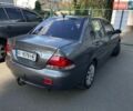 Сірий Міцубісі Lancer, об'ємом двигуна 1.58 л та пробігом 288 тис. км за 4300 $, фото 7 на Automoto.ua