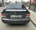 Сірий Міцубісі Lancer, об'ємом двигуна 1.6 л та пробігом 115 тис. км за 2800 $, фото 3 на Automoto.ua