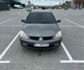 Сірий Міцубісі Lancer, об'ємом двигуна 1.6 л та пробігом 256 тис. км за 4200 $, фото 1 на Automoto.ua