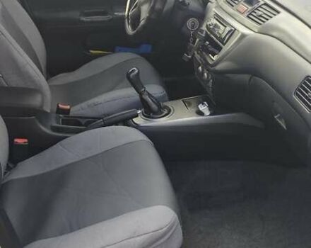 Серый Мицубиси Лансер, объемом двигателя 1.6 л и пробегом 205 тыс. км за 4500 $, фото 7 на Automoto.ua