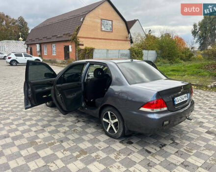 Міцубісі Lancer 2007 у Белой Церкве на Automoto.ua Сірий Міцубісі Lancer, об'ємом двигуна 1.58 л та пробігом 254 тис. км за 3200 $, фото 1 на Automoto.ua
