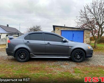 Сірий Міцубісі Lancer, об'ємом двигуна 2 л та пробігом 168 тис. км за 8000 $, фото 2 на Automoto.ua