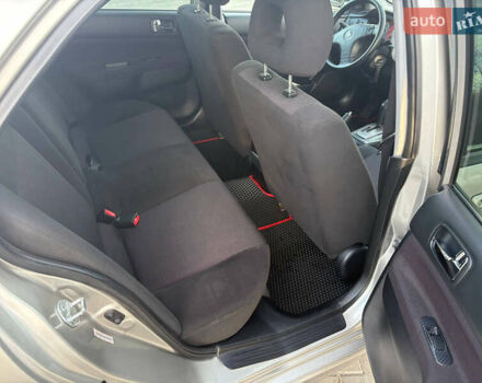 Серый Мицубиси Лансер, объемом двигателя 2 л и пробегом 184 тыс. км за 4900 $, фото 6 на Automoto.ua