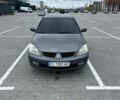 Сірий Міцубісі Lancer, об'ємом двигуна 1.6 л та пробігом 256 тис. км за 4500 $, фото 1 на Automoto.ua