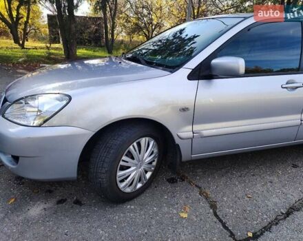 Сірий Міцубісі Lancer, об'ємом двигуна 1.58 л та пробігом 122 тис. км за 6300 $, фото 19 на Automoto.ua