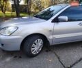 Сірий Міцубісі Lancer, об'ємом двигуна 1.58 л та пробігом 122 тис. км за 6300 $, фото 19 на Automoto.ua