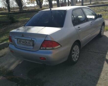 Сірий Міцубісі Lancer, об'ємом двигуна 1.6 л та пробігом 142 тис. км за 4700 $, фото 3 на Automoto.ua