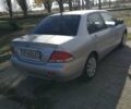 Сірий Міцубісі Lancer, об'ємом двигуна 1.6 л та пробігом 142 тис. км за 4700 $, фото 3 на Automoto.ua