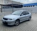 Сірий Міцубісі Lancer, об'ємом двигуна 1.58 л та пробігом 237 тис. км за 3050 $, фото 1 на Automoto.ua