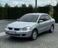 Сірий Міцубісі Lancer, об'ємом двигуна 1.6 л та пробігом 250 тис. км за 4999 $, фото 1 на Automoto.ua