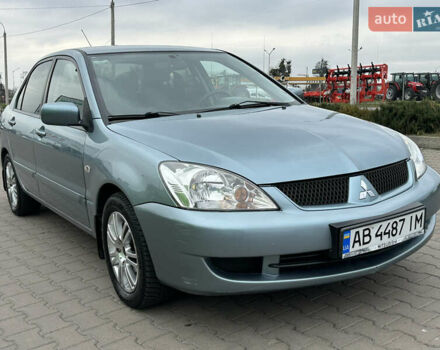 Серый Мицубиси Лансер, объемом двигателя 1.6 л и пробегом 116 тыс. км за 5050 $, фото 2 на Automoto.ua